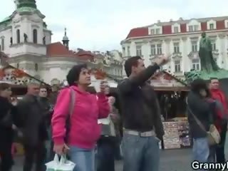 Old tourist is picked up and screwed on floor